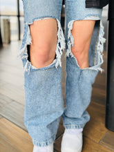 Distressed Medium Wash Jeans